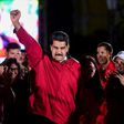 Venezuelan President Nicolas Maduro celebrates the results of the election of a "Constituent Assembly" that the country's attorney general denounces as an illegitimate expression of "dictatorial ambition"