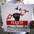 A protest in May against curbs on the Thai media: now a columnist faces charges