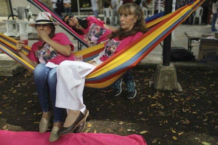 Colombians celebrate the World Day of Laziness in Itagui, near Medellin. The day was created to call attention to the need to unwind from the stresses of working life