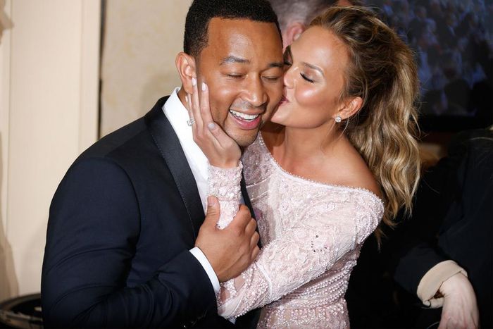 Chrissy Teigen and John Legend are a poster couple for PDA [Credit Getty]