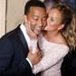 Chrissy Teigen and John Legend are a poster couple for PDA [Credit Getty]