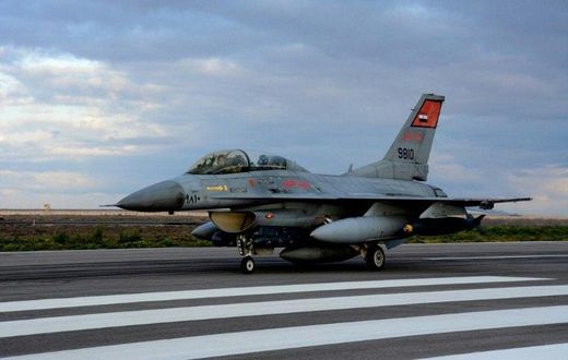 A handout picture released by the Egyptian defence ministry on February 16, 2015 shows a fighter jet landing at an undisclosed location in Egypt following air strikes in Libya