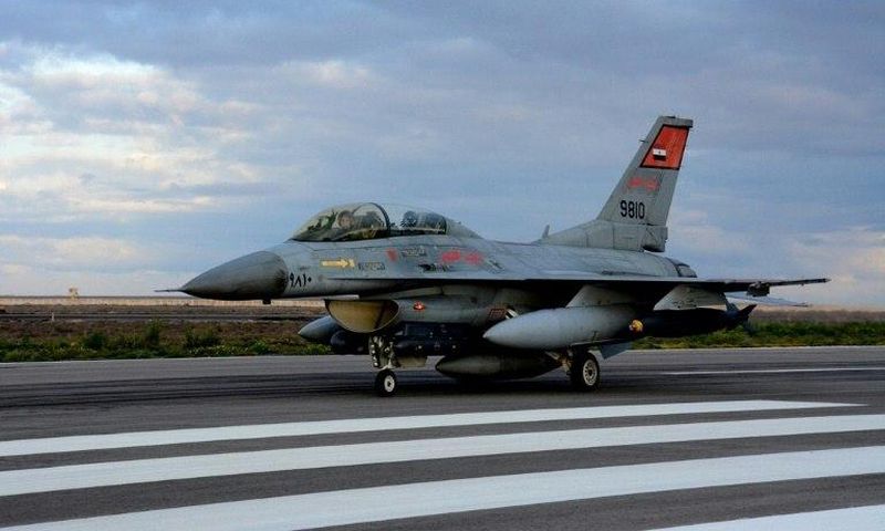 A handout picture released by the Egyptian defence ministry on February 16, 2015 shows a fighter jet landing at an undisclosed location in Egypt following air strikes in Libya