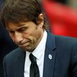 Chelsea's Italian head coach Antonio Conte reacts on the pitch after their defeat to Arsenal after the English FA Cup final football match between Arsenal and Chelsea on May 27, 2017