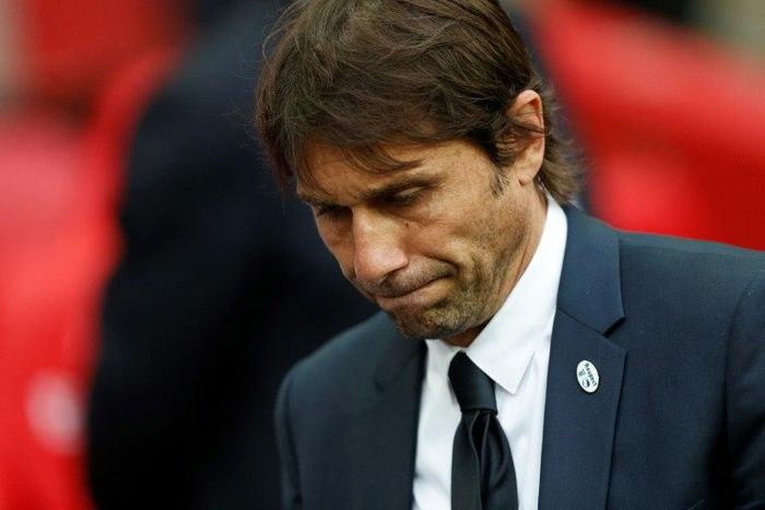 Chelsea's Italian head coach Antonio Conte reacts on the pitch after their defeat to Arsenal after the English FA Cup final football match between Arsenal and Chelsea on May 27, 2017