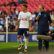 Tottenham Hotspur's defender Kieran Trippier (L) leaves the pitch after picking up an injury during a pre-season friendly football match against Juventus at Wembley stadium in London on August 5, 2017