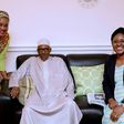 In this handout photograph taken and released by The Nigerian State House on July 26, ailing Nigerian President Muhammadu Buhari (C) poses with his wife Aisha Buhari (R) and the wife of Benue State Governor Eunice Ortom as he received a courtesy visit ...