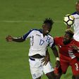 Alberth Elis #17 of Honduras and Manjrekar James #3 of Canada play during the 2017 CONCACAF Gold Cup at Toyota Stadium