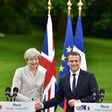 Britain's Prime Minister Theresa May (L) and France's President Emmanuel Macron meet at The Elysee Palace in Paris on June 13, 2017