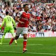 Arsenal's Chilean striker Alexis Sanchez (right) celebrates after scoring the opening goal of the English FA Cup final football match between Arsenal and Chelsea at Wembley stadium in London on May 27, 2017