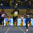 Usain Bolt ran in front of a sea of green and yellow clad Jamaican fansand cruised to victory in a time of 10.03, well below his world record time but good enough to beat a solid field that included runner-up Javaughn Minzie of Jamaica