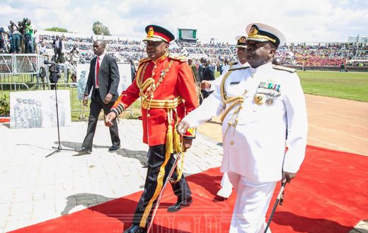 President Uhuru Kenyatta in the red military tunic