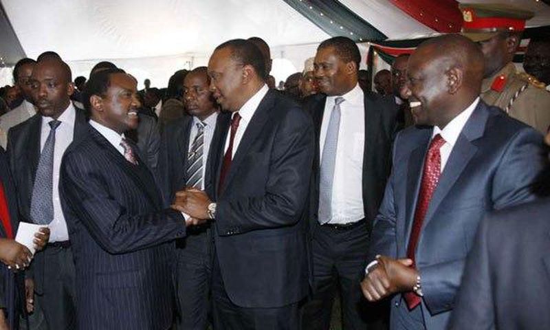 President Uhuru Kenyatta greeting Wiper Leader Kalonzo Musyoka as DP William Ruto watches