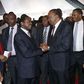 President Uhuru Kenyatta greeting Wiper Leader Kalonzo Musyoka as DP William Ruto watches