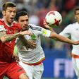 Russia forward Fedor Smolov (L) vies for the ball against Mexico defender Diego Reyes during the 2017 Confederations Cup group A match in Kazan on June 24, 2017