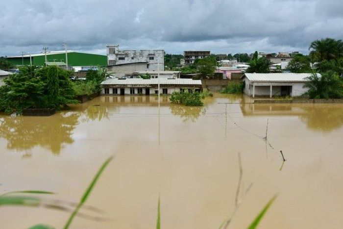 A picture shows a flooded area in a suburb of Abidjan following heavy rainfall in the Ivory Coast on June 13, 2017