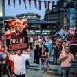 A pro-Erdogan supporter holds a portrait of US-based cleric Fethullah Gulen during a rally against the military coup in Istanbul on July 25, 2016