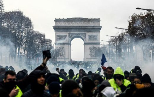 Yellow-vest protesters on the Champs-Elysees in Paris on Saturday