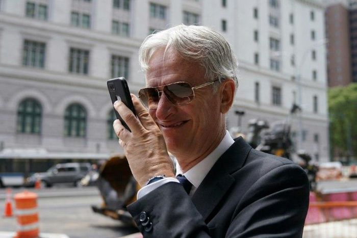 Former Argentine banker Jorge Arzuaga leaves the federal court in New York after pleading guilty to money laundering charges in the FIFA corruption case