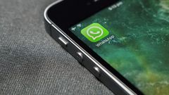 WhatsApp icon on a phone screen