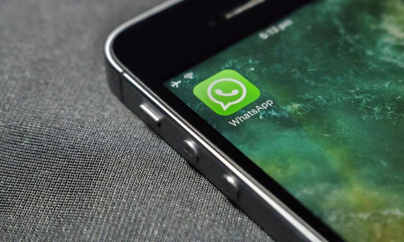 WhatsApp icon on a phone screen