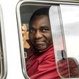 Zambian opposition leader Hakainde Hichilema, seen waving to supporters from a police van in April and facing treason charges, has been transferred to a maximum security jail outside the capital Lusaka