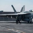 An F/A-18E Super Hornet attached to the "Tomcatters" of Strike Fighter Squadron (VFA) 31 on the deck of the Nimitz-class aircraft carrier USS George H.W. Bush to conduct flight operations in support of Operation Inherent Resolve on June 6, 2017