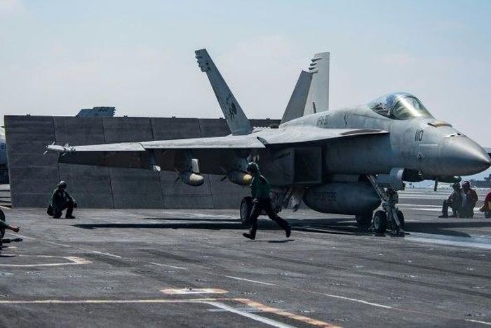 An F/A-18E Super Hornet attached to the "Tomcatters" of Strike Fighter Squadron (VFA) 31 on the deck of the Nimitz-class aircraft carrier USS George H.W. Bush to conduct flight operations in support of Operation Inherent Resolve on June 6, 2017