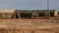 Member of a group of migrants (pictured October 2015), who have been living in a military facility at Britain's Dhekelia garrison in Cyprus since the boat in which they were travelling to Italy foundered in 1998, will be allowed to settle in Britain