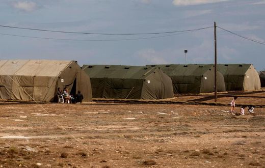 Member of a group of migrants (pictured October 2015), who have been living in a military facility at Britain's Dhekelia garrison in Cyprus since the boat in which they were travelling to Italy foundered in 1998, will be allowed to settle in Britain