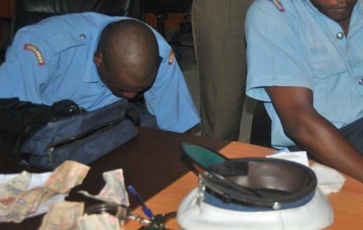 2 police officers who were arrested during a past crackdown