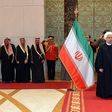 Kuwaiti Emir Sheikh Sabah al-Ahmad Al-Sabah (R) and Iranian President Hassan Rouhani (2-R) attend a ceremony in Kuwait City on February 15, 2017