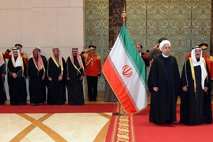 Kuwaiti Emir Sheikh Sabah al-Ahmad Al-Sabah (R) and Iranian President Hassan Rouhani (2-R) attend a ceremony in Kuwait City on February 15, 2017