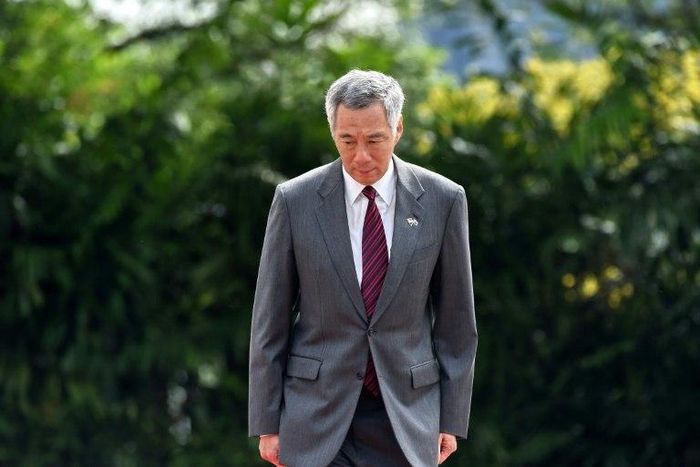 Singapore Prime Minister Lee Hsien Loong stands at an event at the Istana presidential palace in Singapore