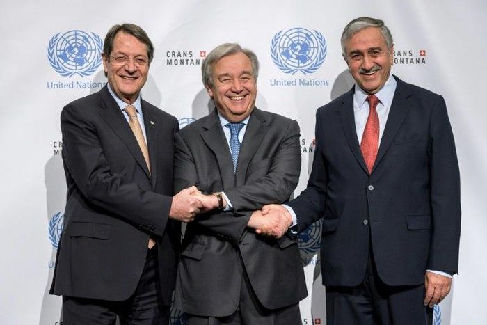 UN chief Antonio Guterres, seen here between Greek Cypriot President Nicos Anastasiades (L) and Turkish Cypriot Leader Mustafa Akinci (R), is heading to Switzerland to press them to reach a historic agreement on reunifying Cyprus.