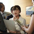 Japan's Defence Minister Tomomi Inada (C) will resign over an alleged coverup involving military documents