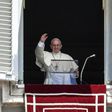 Pope Francis waves at the crowd during the Angelus prayer at the Vatican, on July 2, 2017