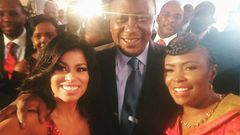 President Uhuru Kenyatta poses for a selfie with media personalities Caroline Mutoko (right) and Julie Gichuru.