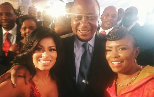 President Uhuru Kenyatta poses for a selfie with media personalities Caroline Mutoko (right) and Julie Gichuru.