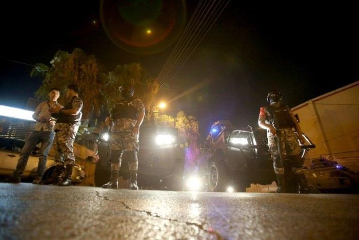 Jordanian security forces stand guard outside the Israeli embassy in Amman following an 'incident' on July 23, 2017 in which a Jordanian man was killed and an Israeli seriously injured