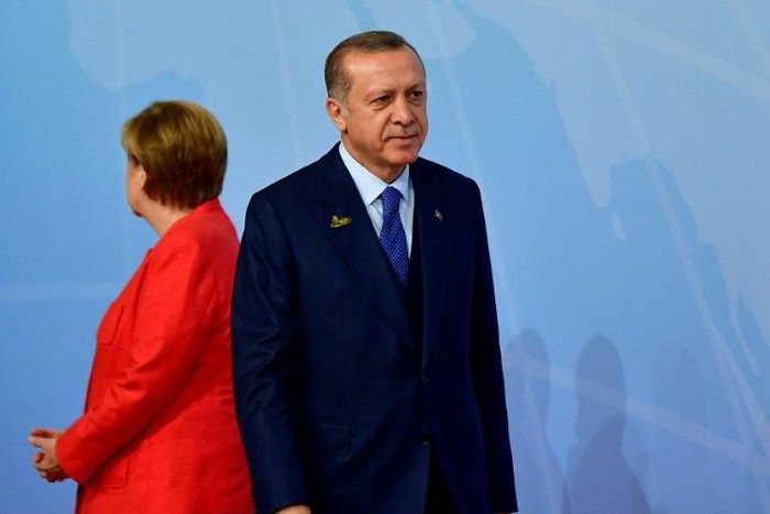 Angela Merkel, left, has grown increasingly distant from Turkish President Recep Tayyip Erdogan in recent months after repeated rows over domestic politics