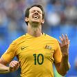 Australia's midfielder Mark Milligan celebrates after scoring with a penalty during the 2017 Confederations Cup group B football match against Cameroon June 22, 2017