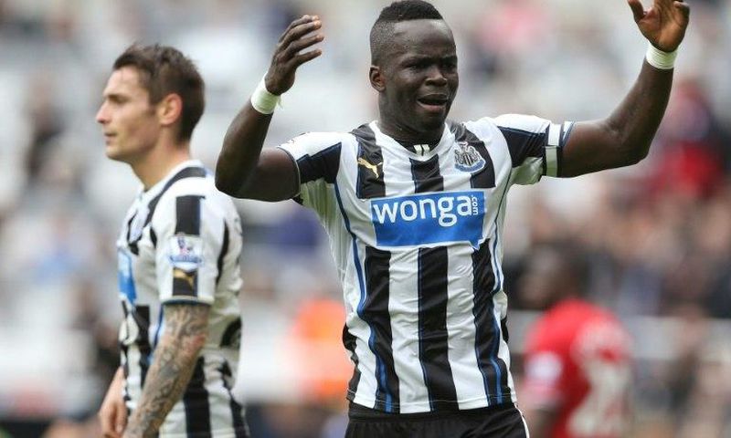 Late Ivory Coast midfielder Cheick Tiote (right) in action for Newcastle United in 2013
