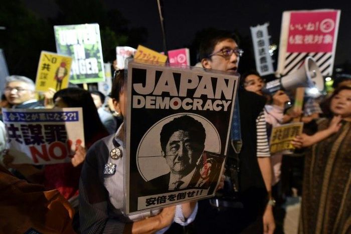 Protesters demonstrate against a controversial anti-terror bill near parliament in Tokyo. Rights groups say it is so broad it could be abused to allow wiretapping of innocent citizens and threaten privacy and freedom of expression