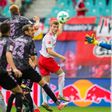 Leipzig's Timo Werner (C) scores the first goal for his team during their match against SC Freiburg in Leipzig, eastern Germany on August 27