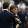 Tottenham Hotspur's head coach Mauricio Pochettino (L) and Chelsea's head coach Antonio Conte interact during an English Premier League football match in London, on August 20, 2017