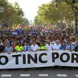 Tens of thousands marched in Barcelona on Saturday to commemorate the two deadly attacks in Catalonia, including Spain's King Felipe VI