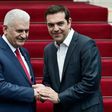 Greek Prime Minister Alexis Tsipras (left) and his Turkish counterpart Binali Yildirim struck a positive note after their talks in Athens Monday