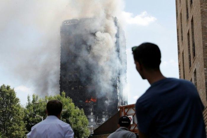 British Prime Minister Theresa May's effort to form a new cabinet have met more delays after a deadly tower block blaze in west London
