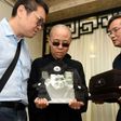 Liu Xia (C) was last seen in government-released images of her dissident husband's sea burial on July 15, and China has been under international pressure to free her and let her travel abroad